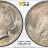 1922 Peace Dollar, Champagne-Gold MS65 PCGS